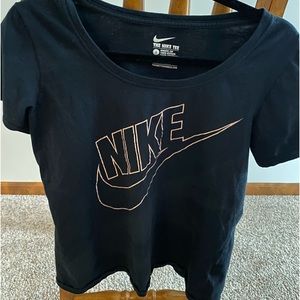 Women’s black and gold Nike t-shirt